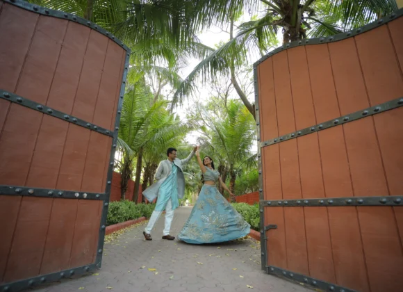 Bride and groom candid moment captured by Sahajanand Studio, best wedding photographer near me Rajkot. Couple Pose